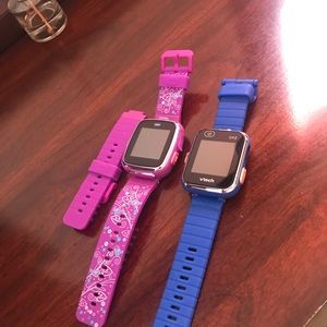 Two kids v-tech watches